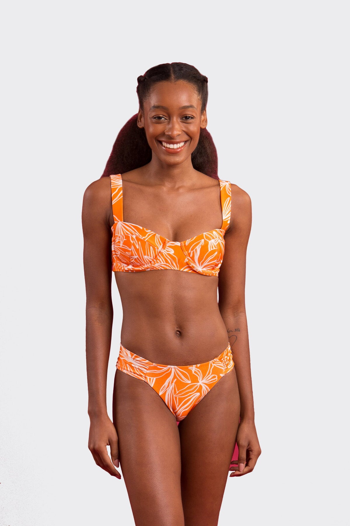Model Front: Rio De Sol Bikini Tops Top Trail-Orange Amelia